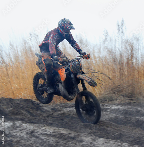 Fototapeta Naklejka Na Ścianę i Meble -  Off-road rider is jumping