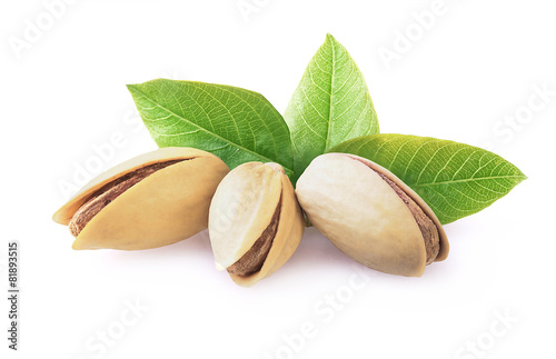 Pistachio nuts with leaves.