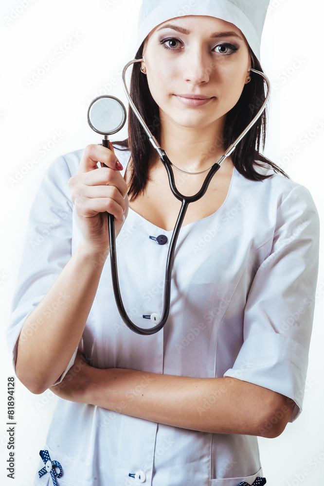 Smiling medical doctor woman with stethoscope. Isolated over Smiling medical doctor woman with stethoscope. Isolated over