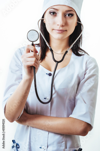 Smiling medical doctor woman with stethoscope. Isolated over