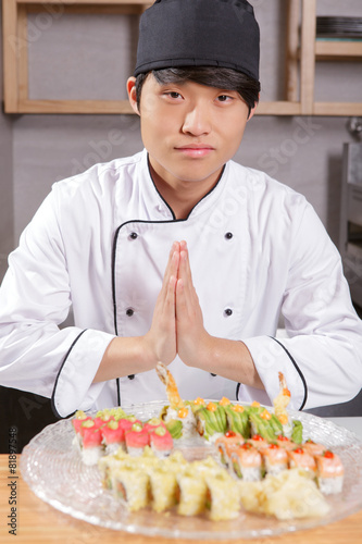 Asian chef cook welcomes guests
