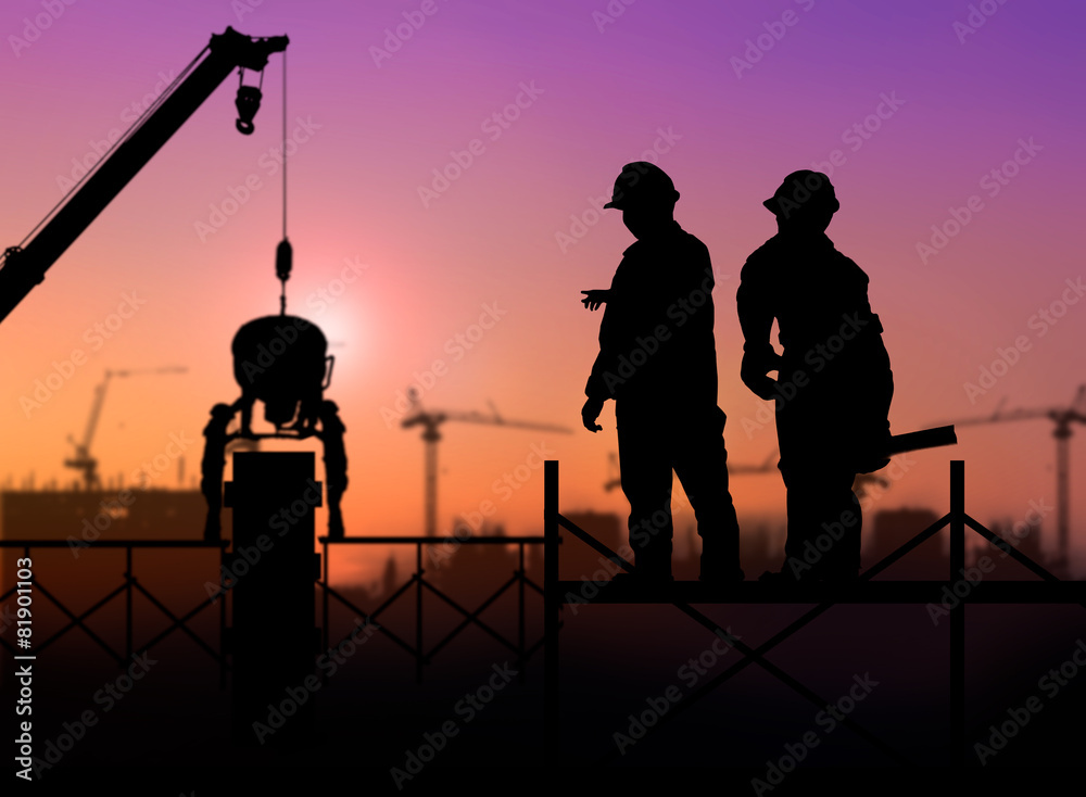 silhouette engineer looking a building site over Blurred constru