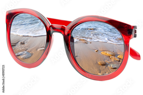 Summertime concept - Sunglasses have a beach wave of sea - iso