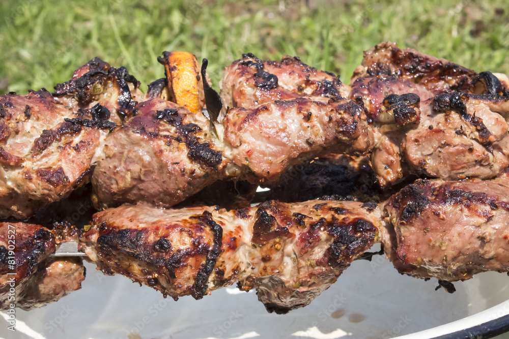 Ready juicy meat cooked on skewers