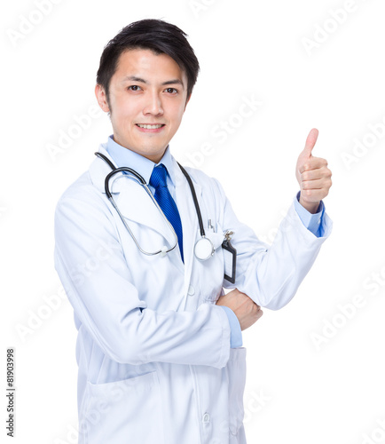 Young Asian doctor with thumb up