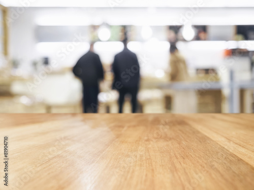 Table Top with Blurred people in shop interior background