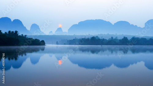 Lake and mountain in sunrise © Peera