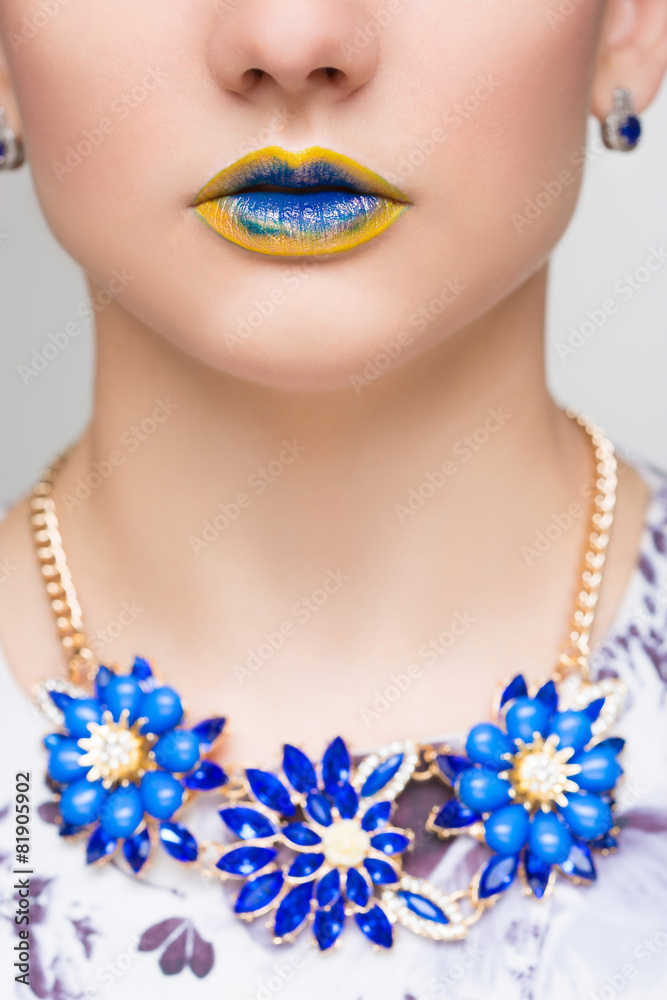 Fashion Yellow, Blue Sexy Lips and Closeup. Make up concept.