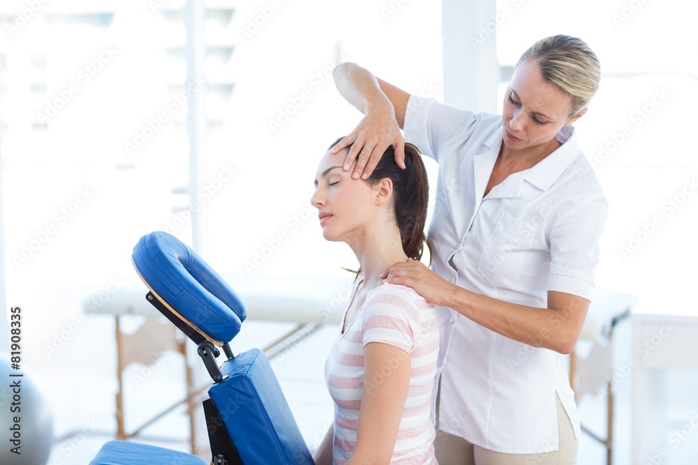 Woman having neck massage Woman having neck massage