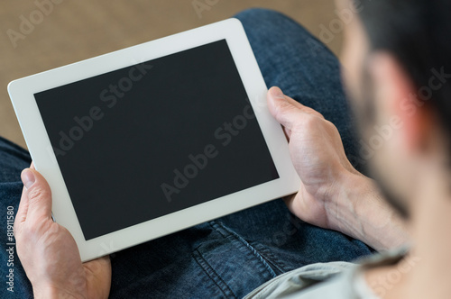 Man using digital tablet