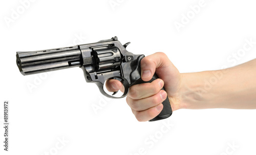 Revolver gun in hand on white background