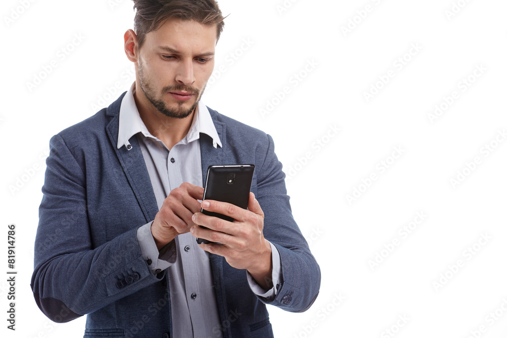 Portrait Of Happy Young Man Using Cell Phone Isolated On White B Portrait Of Happy Young Man Using Cell Phone Isolated On White B