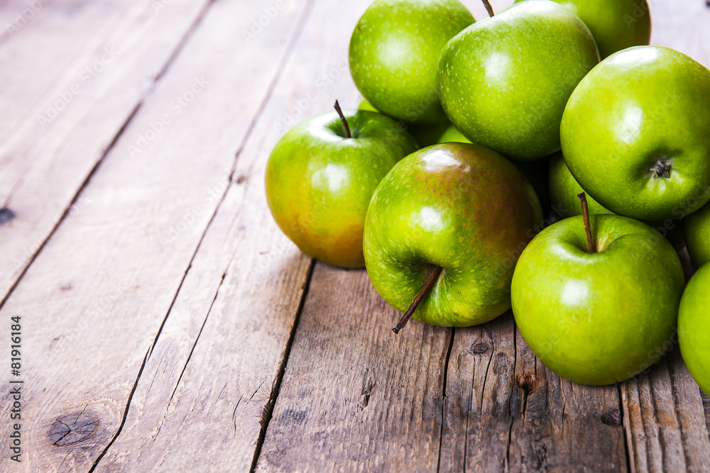fruit. Ripe green apples on wooden background fruit. Ripe green apples on wooden background