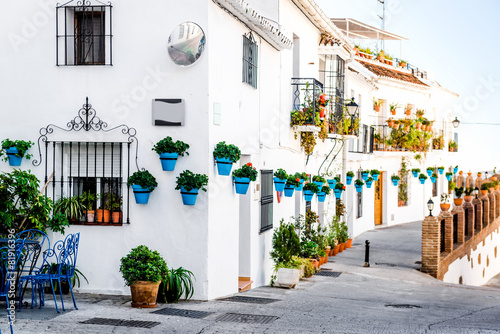 Cuadro en lienzo Picturesque street of Mijas. Andalusian white village