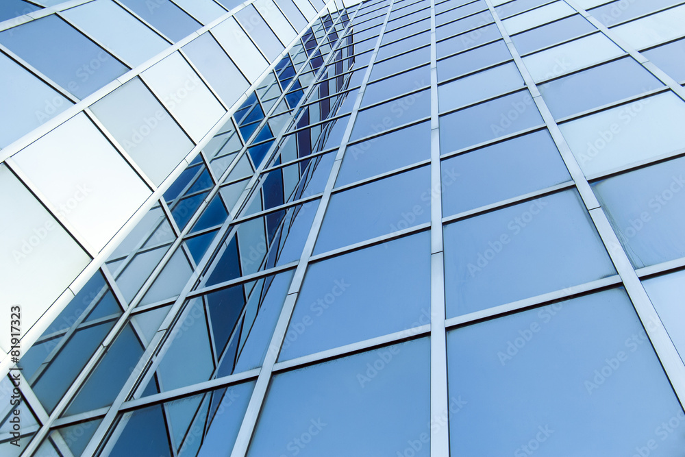 glass and steel facade of modern office building glass and steel facade of modern office building
