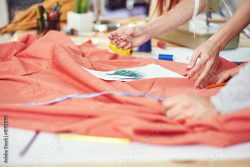  Designers working on the dress plan