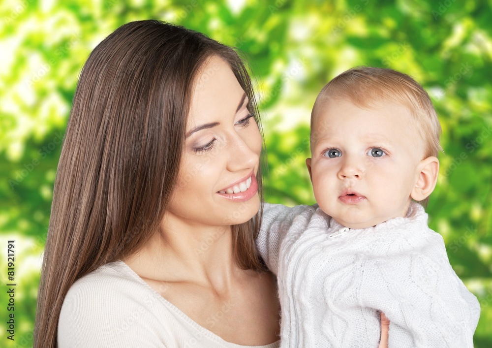 Adorable. Beautiful Mother And Baby outdoors. Nature. Beauty Mum Adorable. Beautiful Mother And Baby outdoors. Nature. Beauty Mum