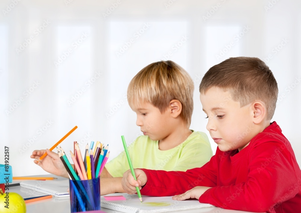 Back. Portrait of lovely girls drawing at workplace with Back. Portrait of lovely girls drawing at workplace with
