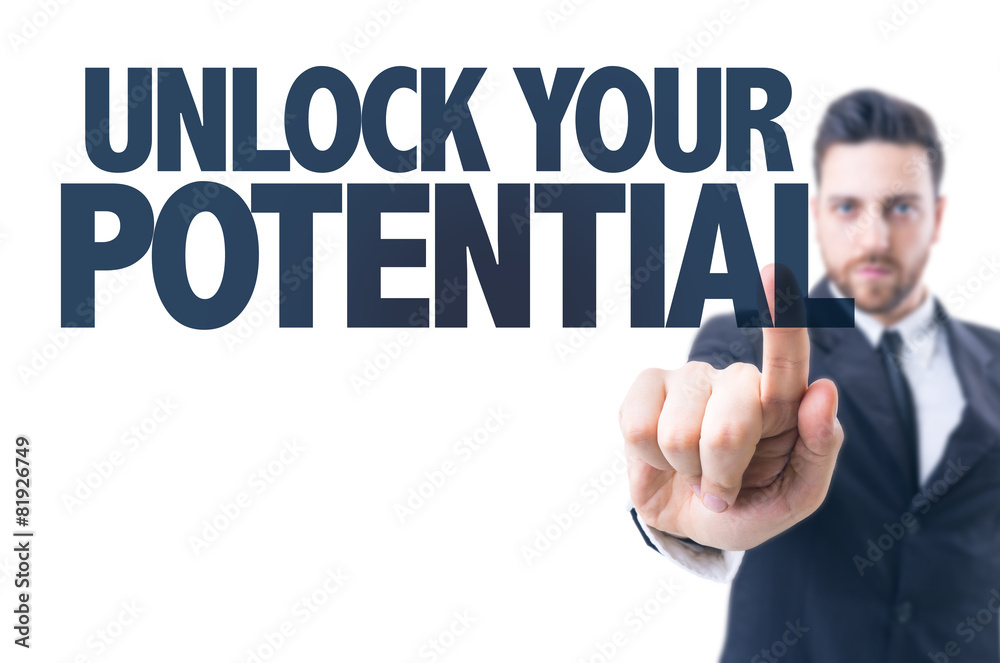 Business man pointing the text: Unlock Your Potential Business man pointing the text: Unlock Your Potential