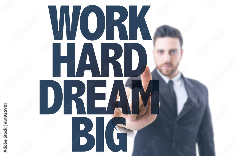 Business man pointing the text: Work Hard Dream Big Business man pointing the text: Work Hard Dream Big