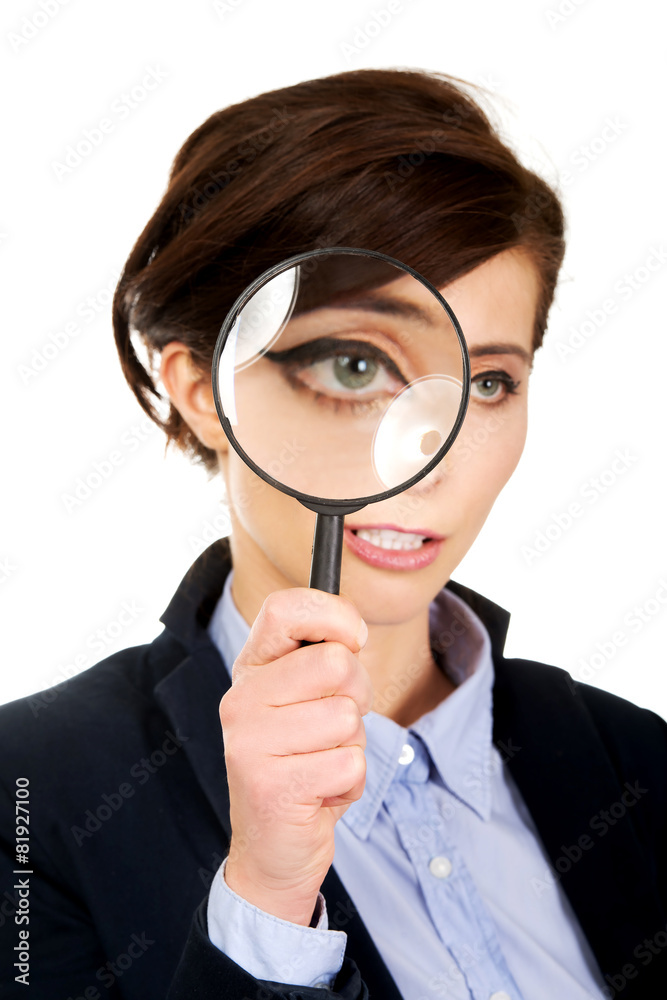 Businesswoman with magnyfing glass. Businesswoman with magnyfing glass.