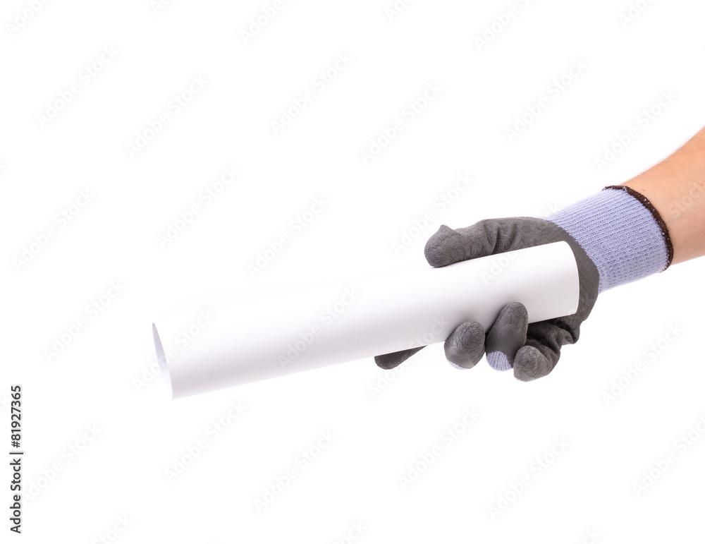 Hand in gray glove holding paper roll. Hand in gray glove holding paper roll.