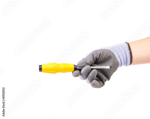 Hand holding screwdriver.