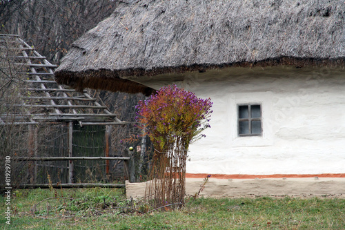 Old traditional Ukrainian clay hut in the village.