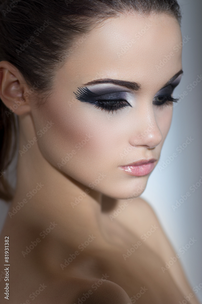 Beautiful portrait of a woman with fashion makeup Beautiful portrait of a woman with fashion makeup