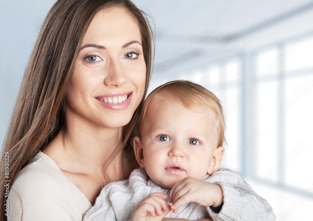 Adorable. A happy family. young mother with baby Adorable. A happy family. young mother with baby