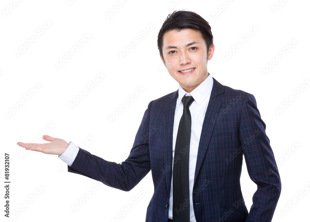Businessman with hand showing something Businessman with hand showing something