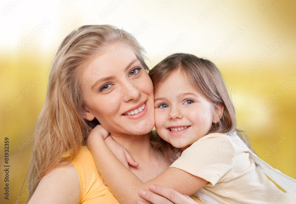 Mom. CLoseup portrait of happy  white mother and young daughter