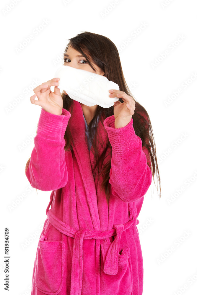 Woman in pink bathrobe with menstruation pad. Woman in pink bathrobe with menstruation pad.