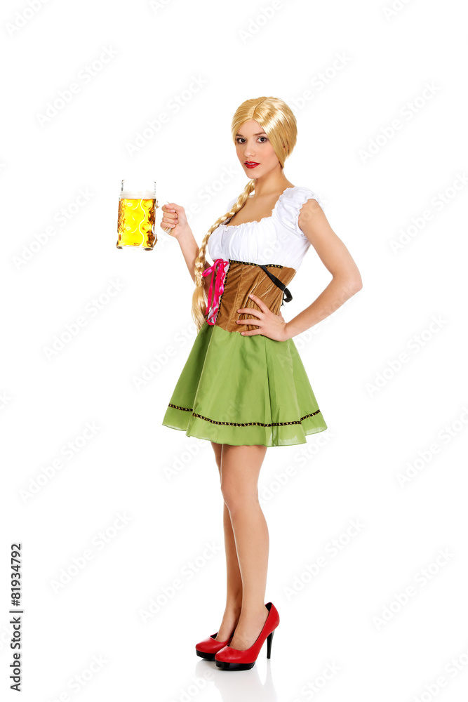 Beautiful bavarian woman with beer. Beautiful bavarian woman with beer.