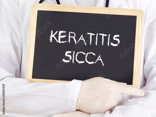 Doctor shows information: keratitis sicca photo