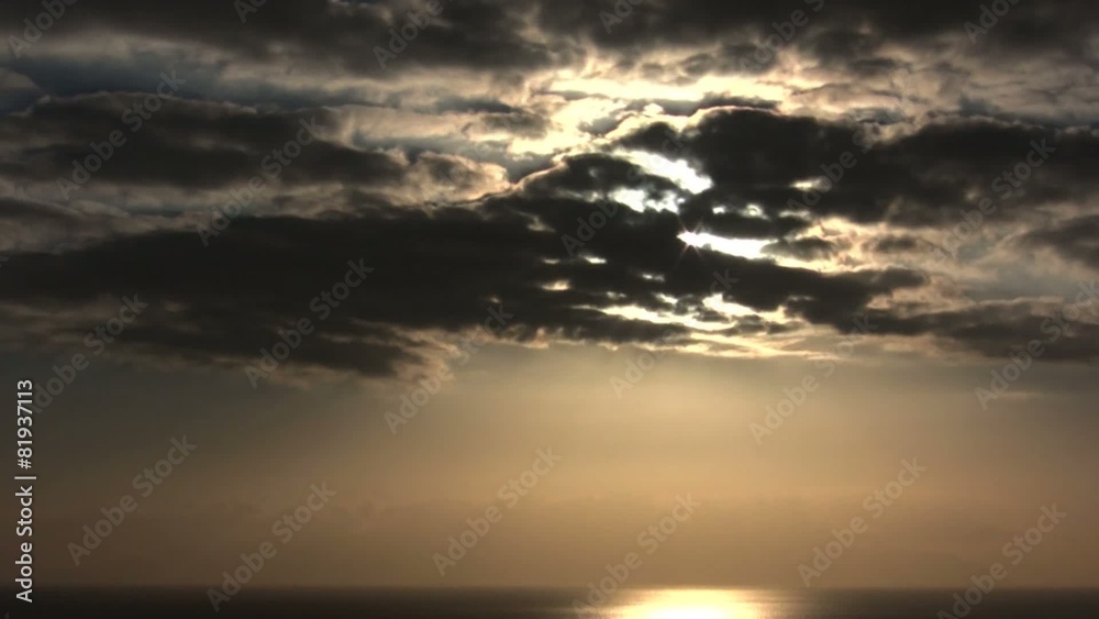 Dramatic clouds time lapse sunset with warm light Dramatic clouds time lapse sunset with warm light