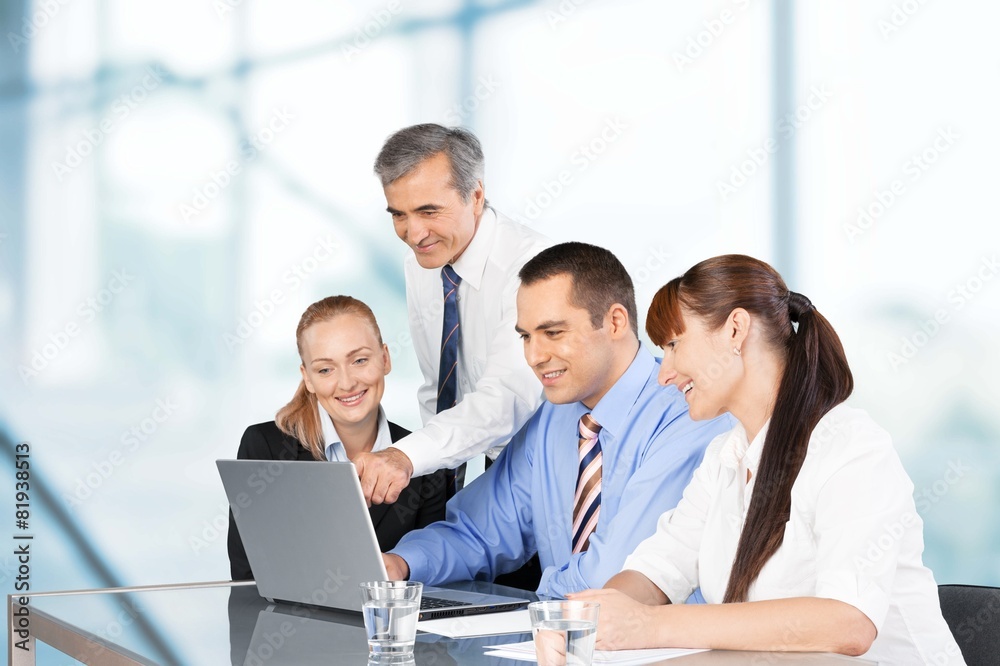 Business. Business people working on a laptop