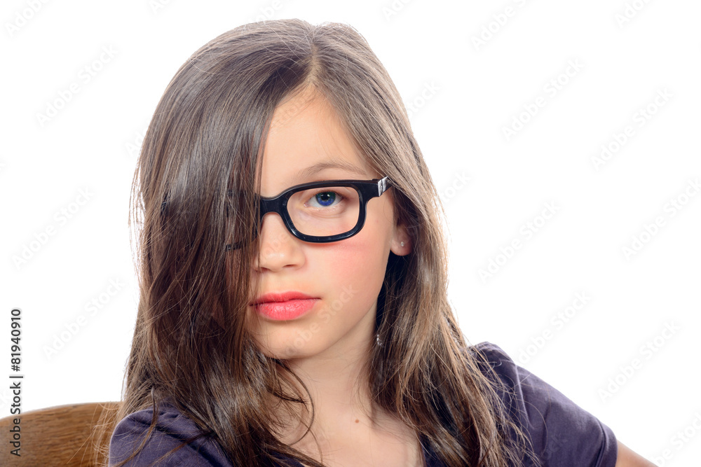 portrait of a pretty little girl with glasses
