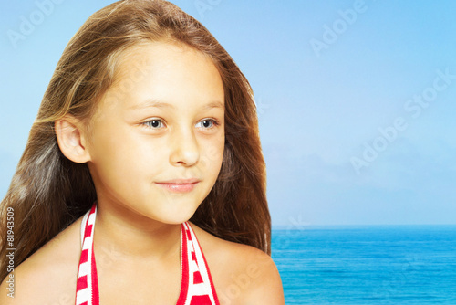 kid on a background of the sea