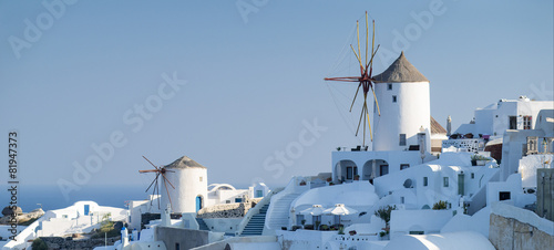 view to city and mills on Santorini in Greece © sergejson