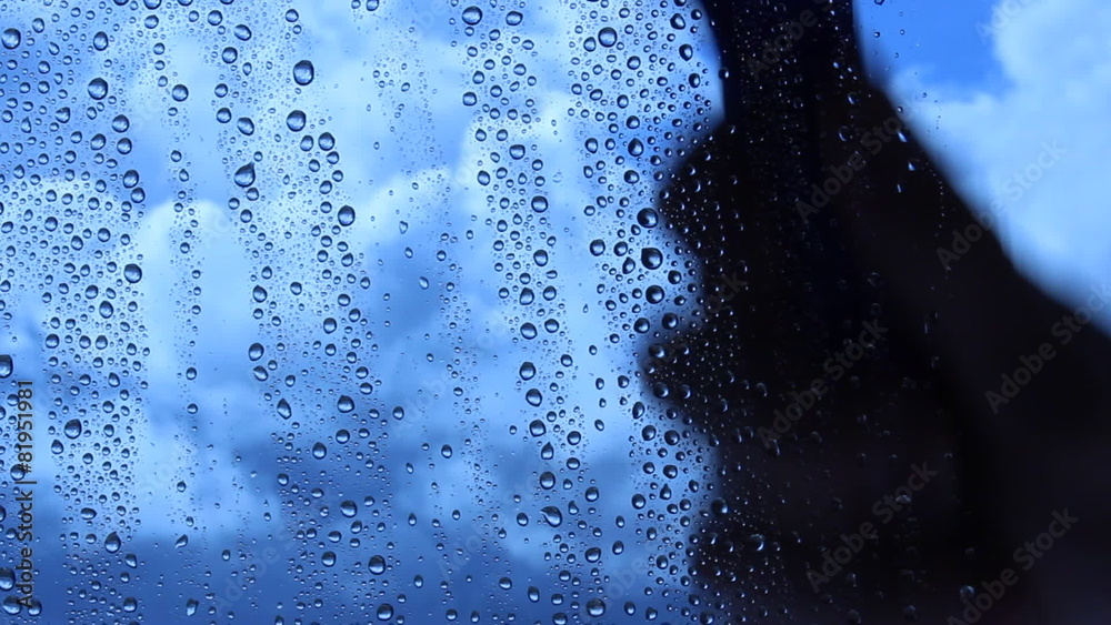Cleaning window of raindrops
