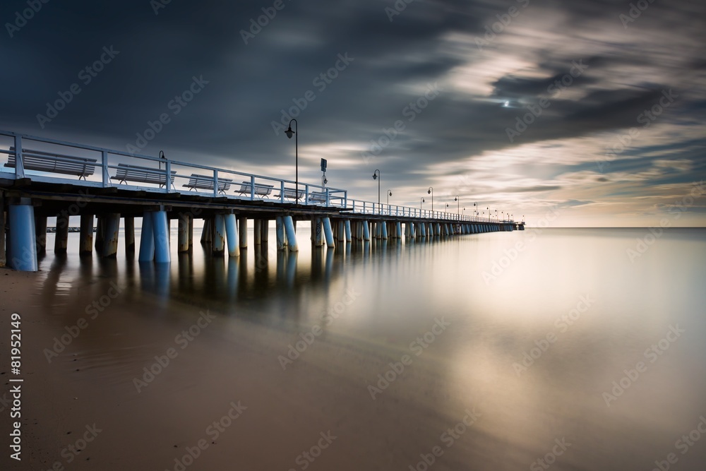 Beautiful long exposure seascape with wooden pier