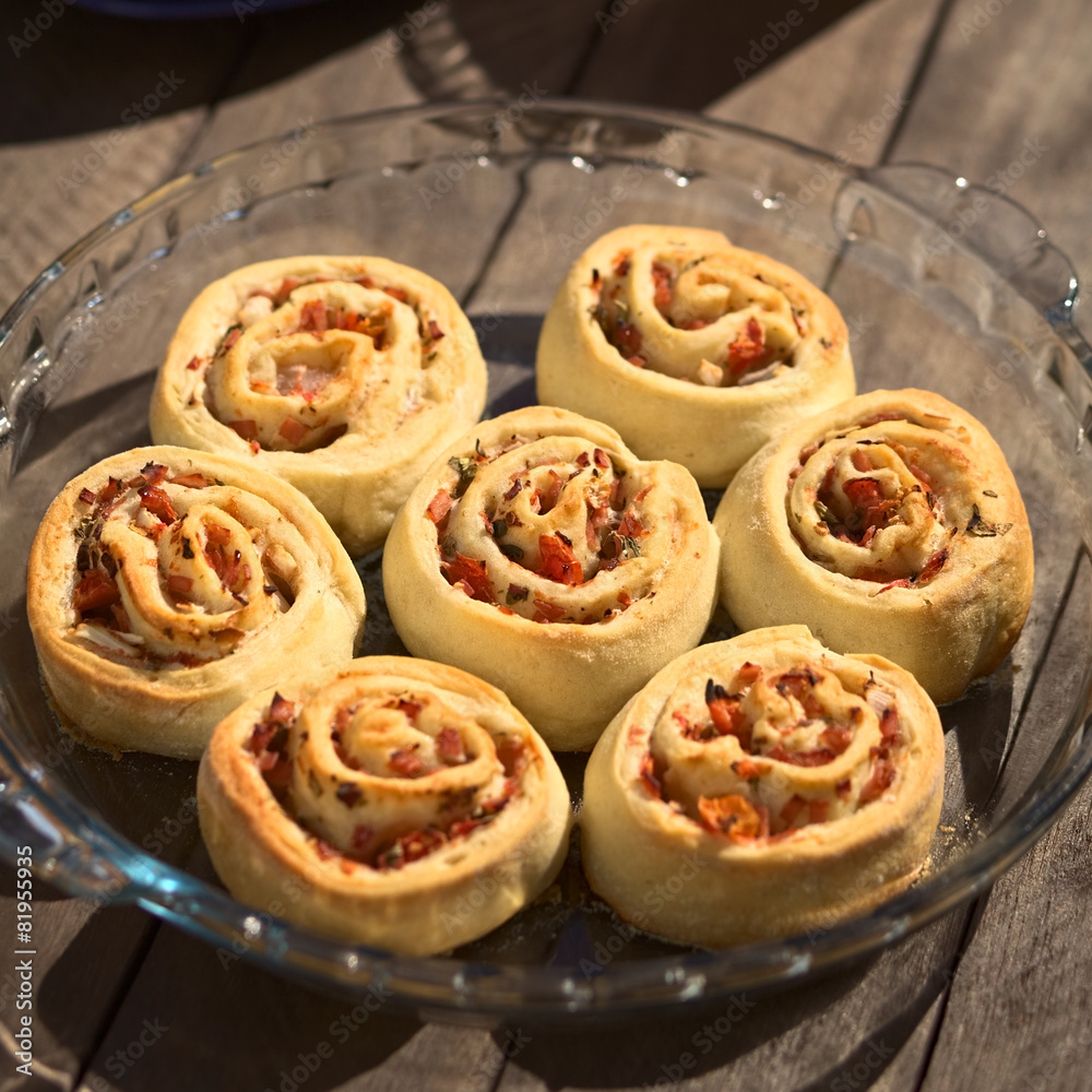 Baked homemade rolls with tomato, ham and herbs Baked homemade rolls with tomato, ham and herbs