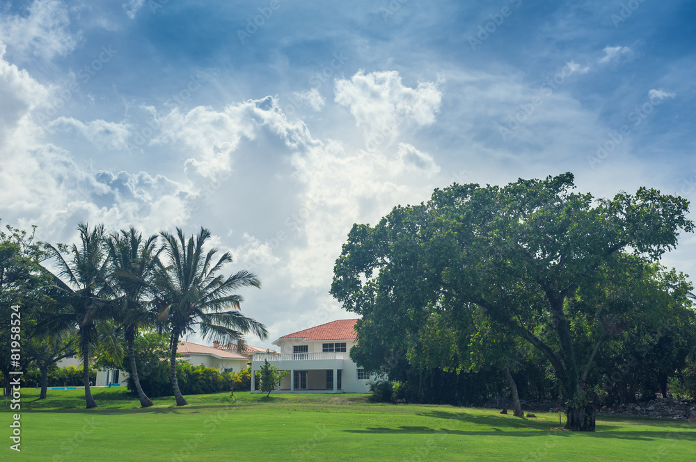Golf course in Dominican republic. field of grass and coconut Golf course in Dominican republic. field of grass and coconut