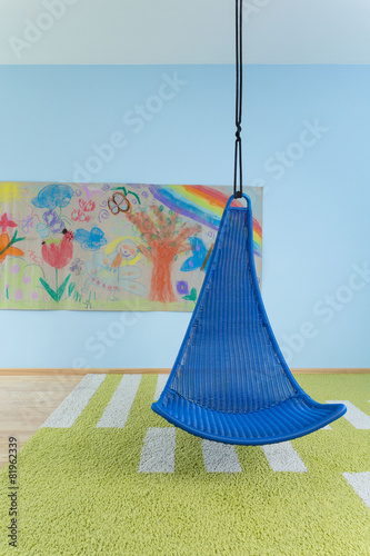 Indoor swing in child's room © Photographee.eu