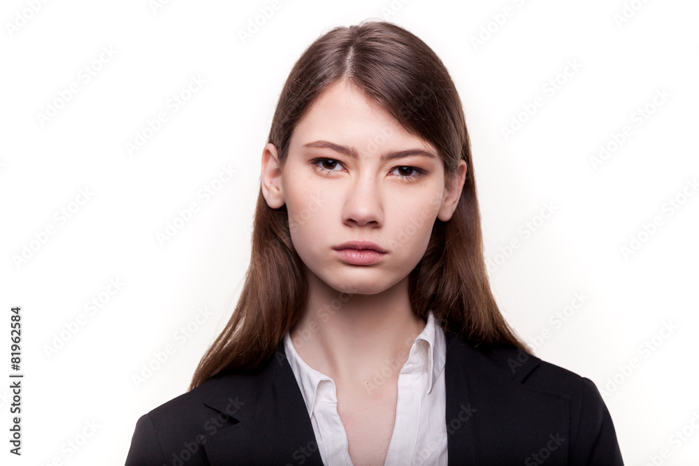 Young pretty businesswoman or student in suit stock image Young pretty businesswoman or student in suit stock image