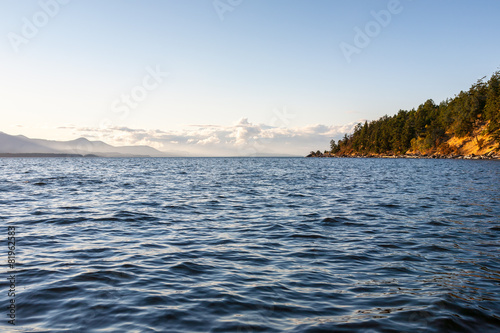 sea under blue cloudy sky