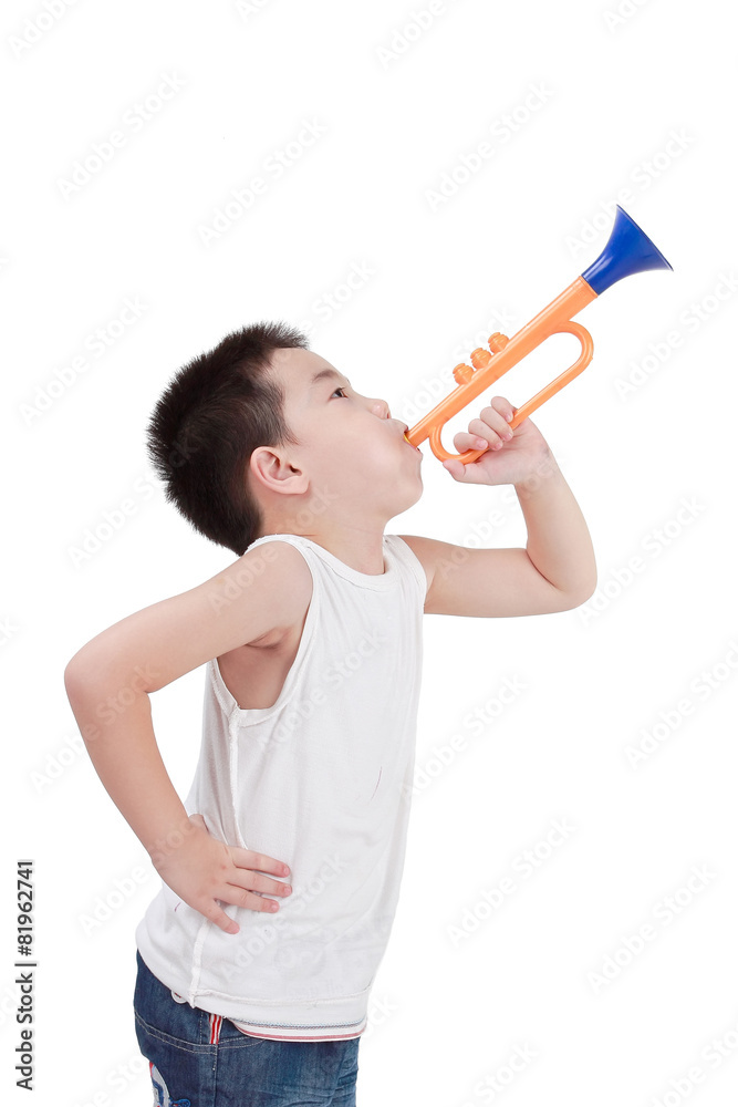 A little boy with a trumpet. A little boy with a trumpet.