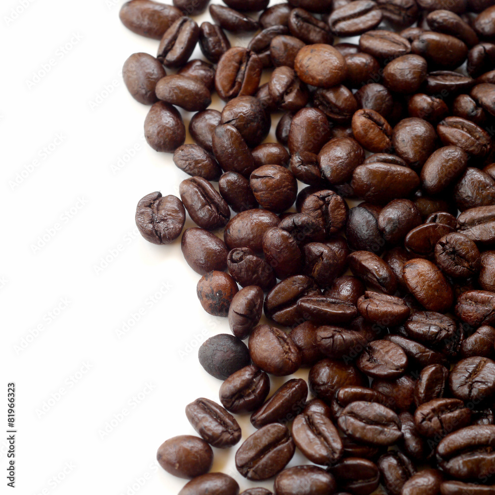 Brown coffee beans isolated on white background Brown coffee beans isolated on white background