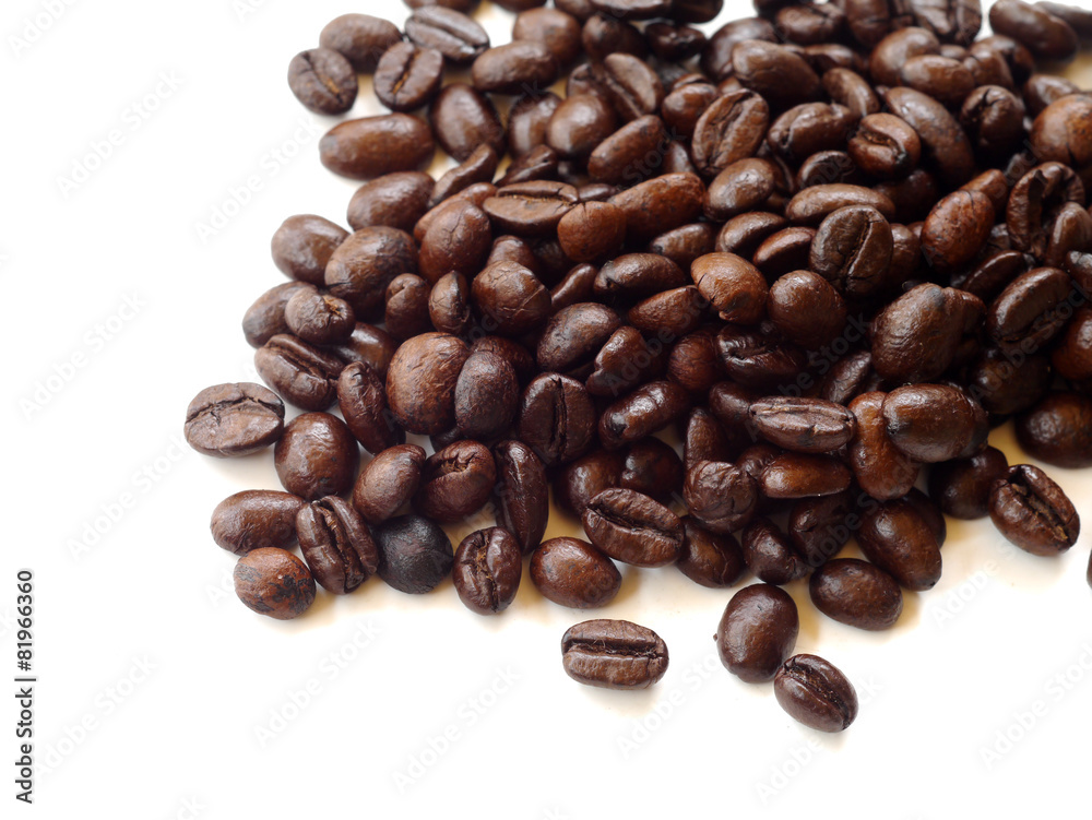 Brown coffee beans isolated on white background Brown coffee beans isolated on white background